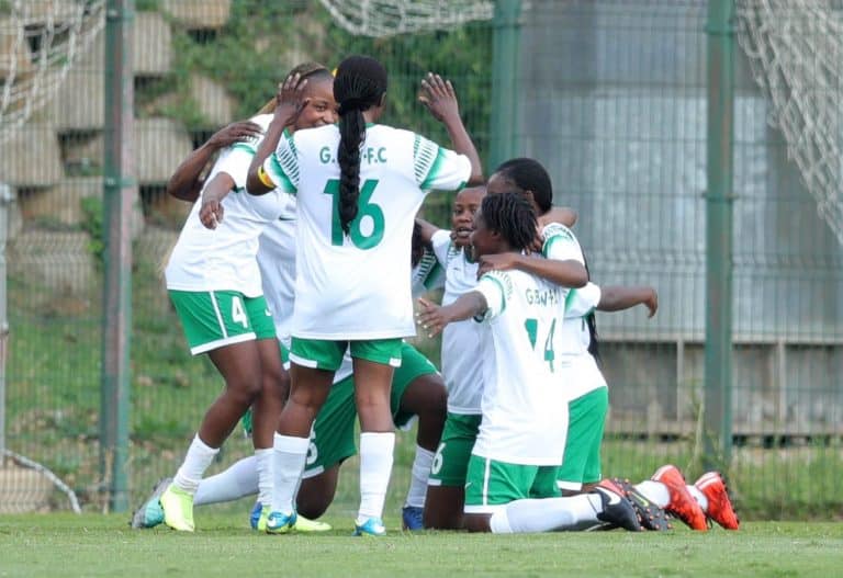 Green Buffaloes players celebrate a goal