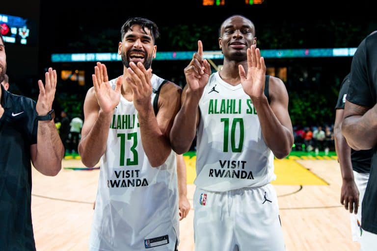 Al Ahli’s Mohamed Abdourahman #13 and Caleb Agada #10 celebrate the team’s last win