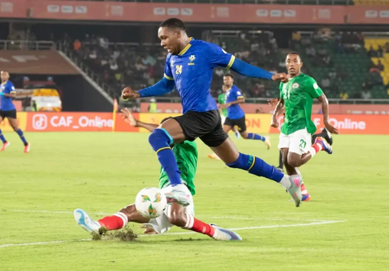 Mzize flying past an opponent