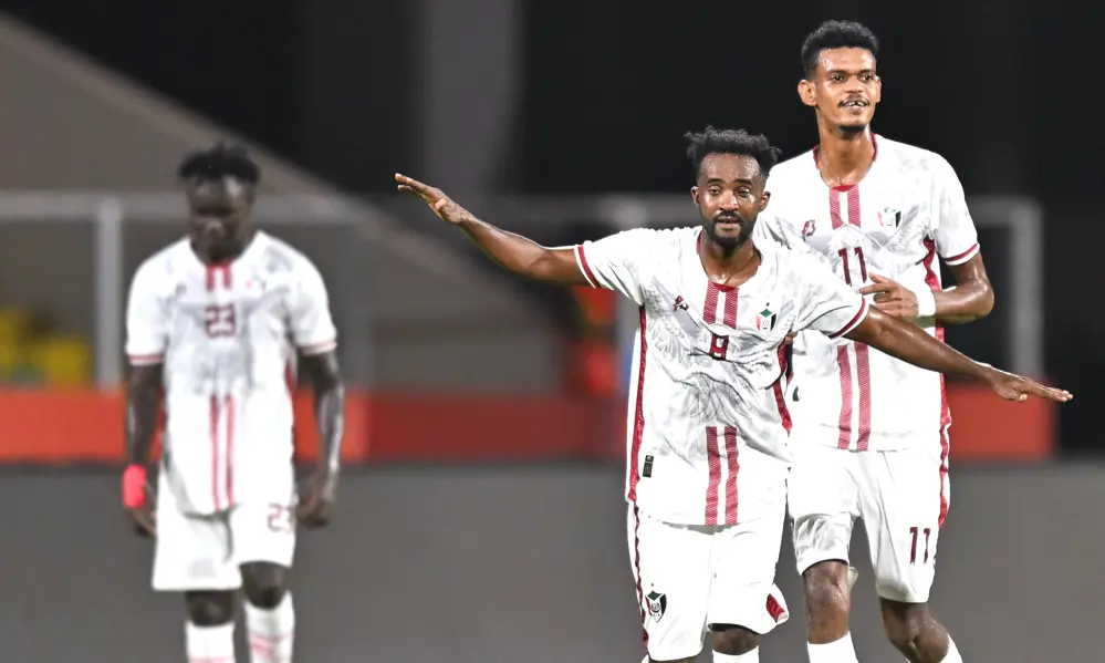 Sudan players celebrate third goal against Nigeria